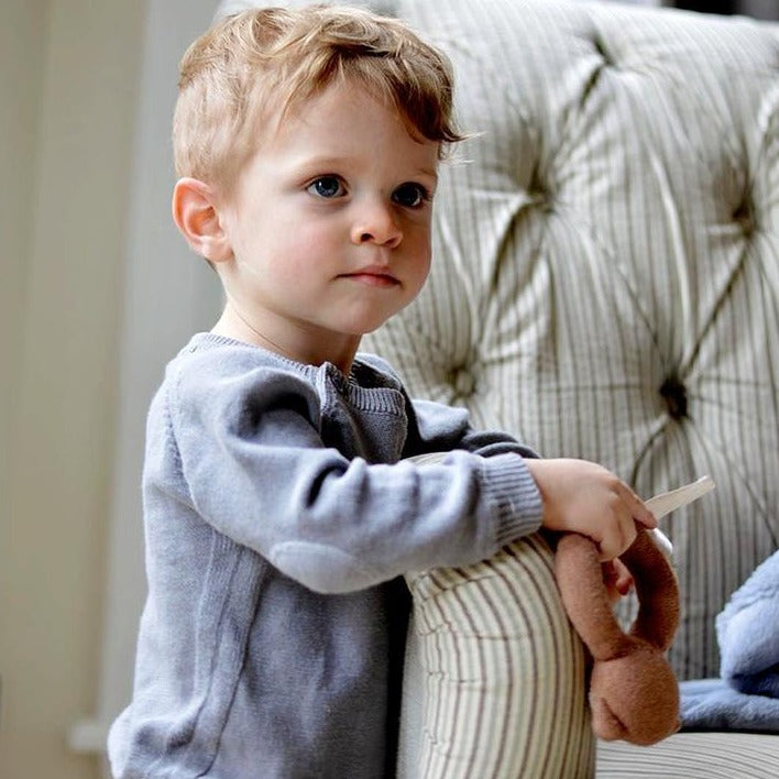 toddler boy wearing Viverano grey knit sweater