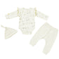 three piece baby girl outfit in a magical forest print, including onesie, leggings and hat.