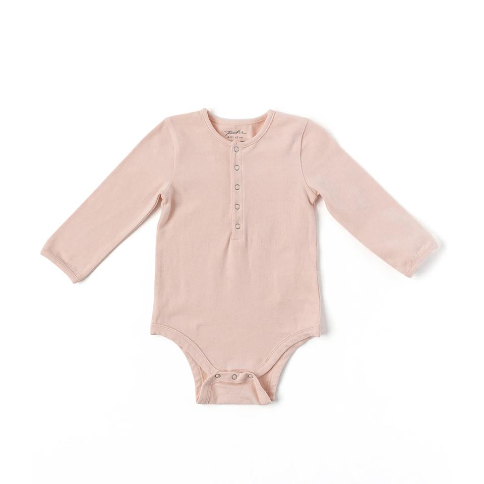 pink cotton long basic sleeve onesie.