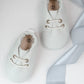 white baby moccasins