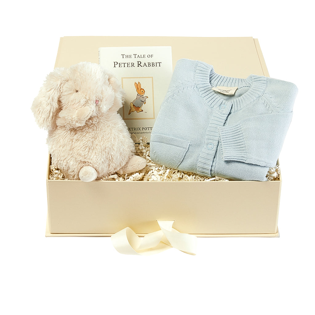 three piece Anna & Amy baby boy gift box with book, plush bunny and baby blue long sleeve onesie
