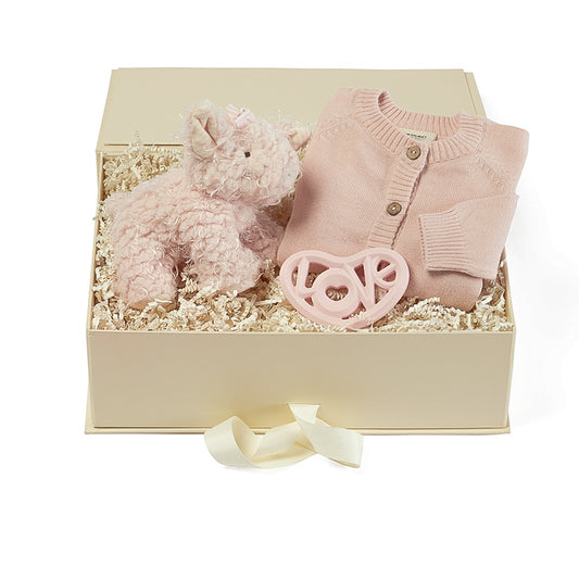 anna & amy gift box for baby girl, including plush pig from bunnies by the bay, a love heart teether and pink onesie.